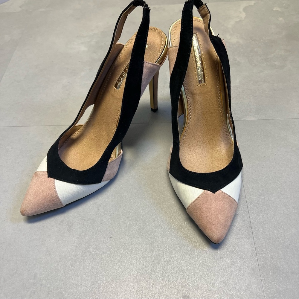 Neutral closed toed sling back heels